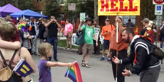 Little girl faces off with anti-gay preacher