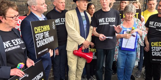 Actor Ian McKellen (center) joins others outside the Russian Embassy in London