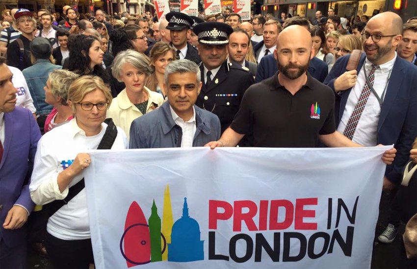 Mayor of London Sadiq Khan (center) with Pride in London volunteers