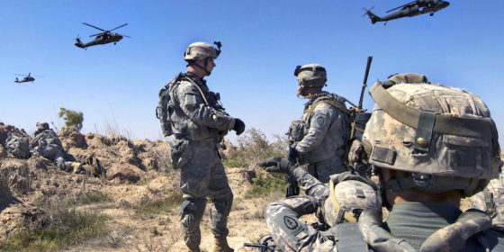 U.S. Soldiers wait to be picked up by helicopters south of Balad Ruz, Iraq, March 22, 2009. The Soldiers are assigned to Recon Platoon, 1st Battalion, 24th Infantry Regiment, 1st Stryker Brigade Combat Team, 25th Infantry Division. (DoD photo by Mass Communication Specialist 2nd Class Walter J. Pels, U.S. Navy/Released)