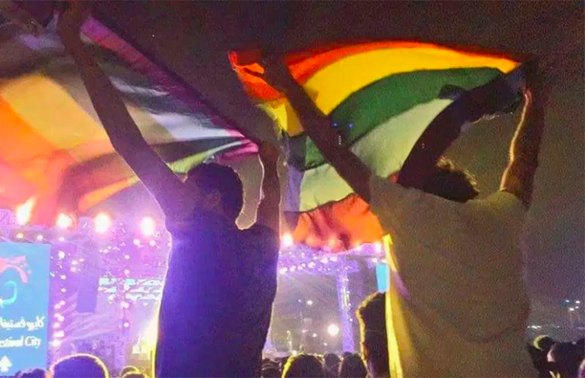 Fans wave rainbow flags at Mashrou' Leila gig in Cairo.