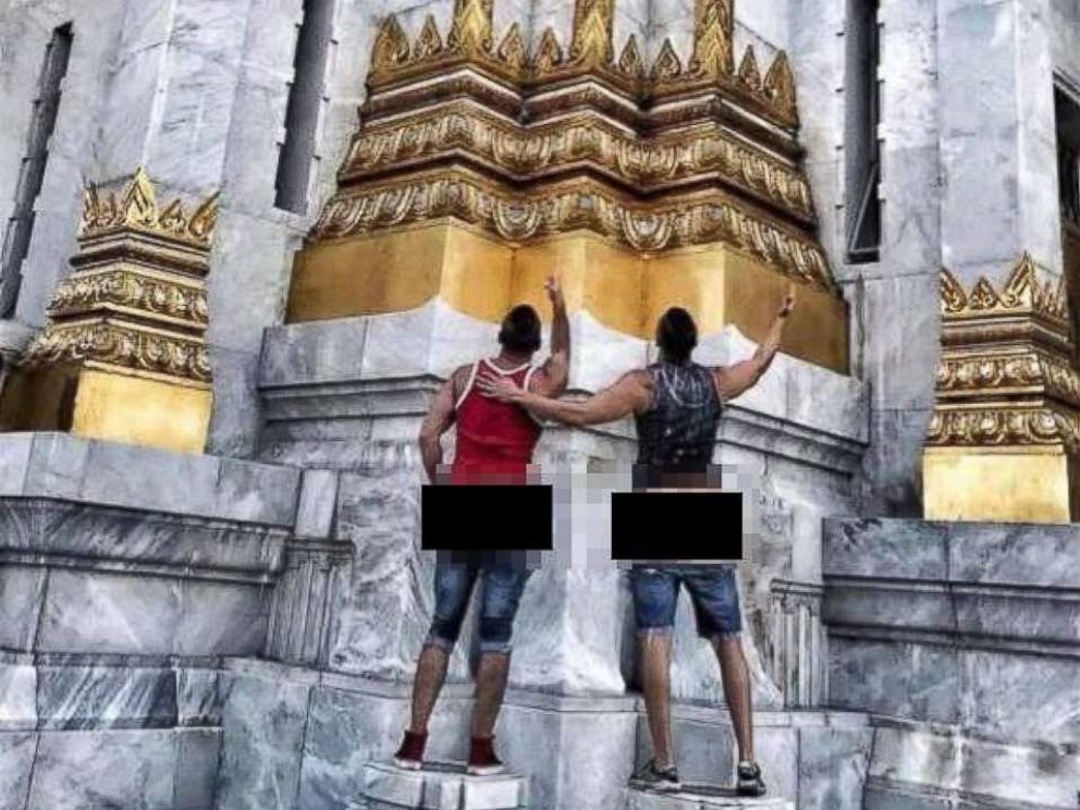 American gay married couple get butts out in photo at thai temple