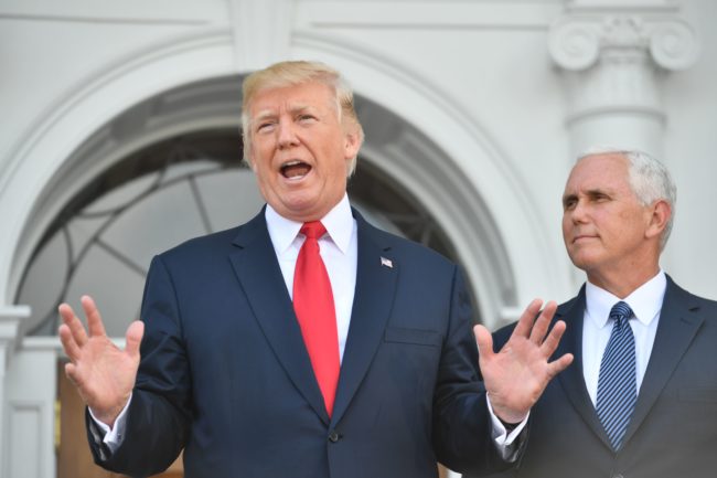 US President Donald Trump and Vice President Mike Pence speak to the press on August 10, 2017, at Trump's Bedminster National Golf Club in New Jersey before a security briefing. / AFP PHOTO / Nicholas Kamm (Photo credit should read NICHOLAS KAMM/AFP/Getty Images)