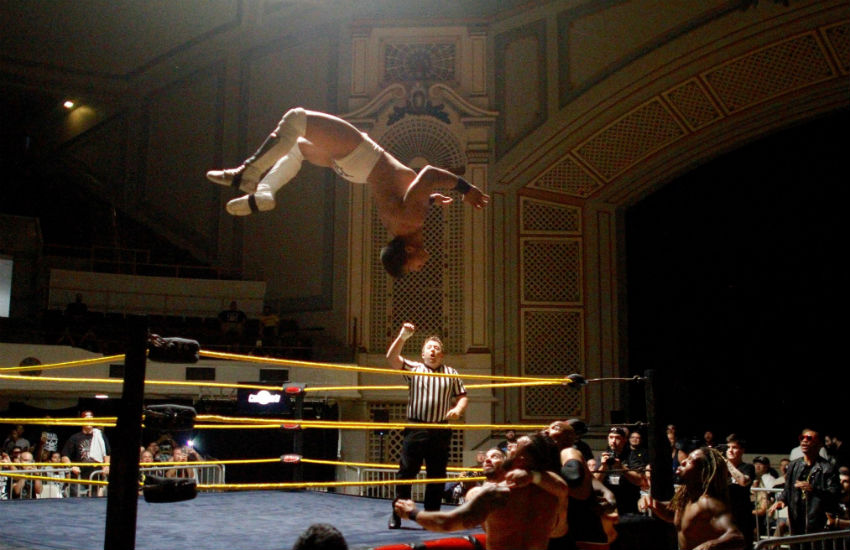 Jake Atlas jumping off ring