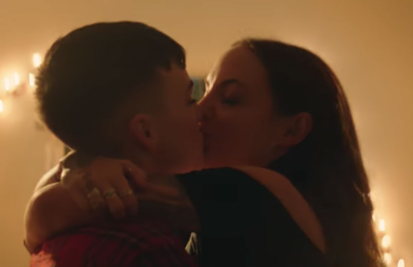 Lesbian couple kissing in McCain ad