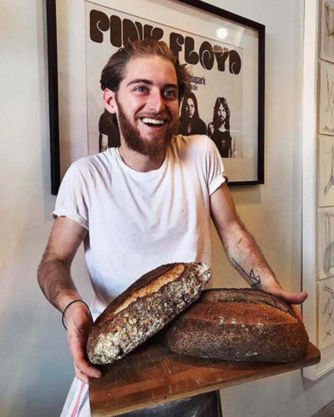 A man with baguettes