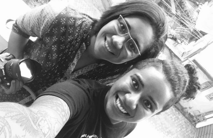 Black and white selfie of two women