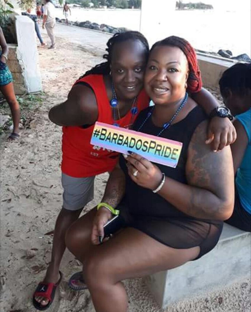 Women enjoying the beach at Barbados Pride