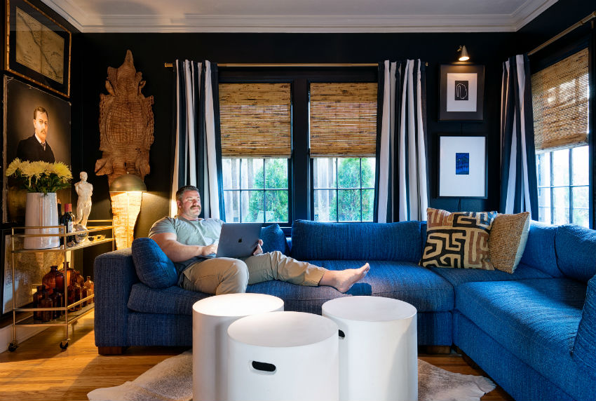 Chris Stout-Hazard at home one a Roger + Chris sofa