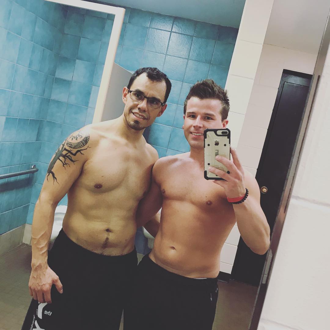 Gus and Wayne shirtless at the gym