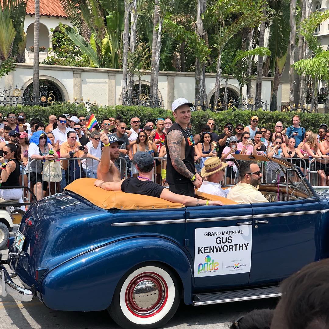Gus riding in his classic car, as the Grand Marshall of Miami Beach Gay Pride 2018 | Photo: Instagram @gilrigaud