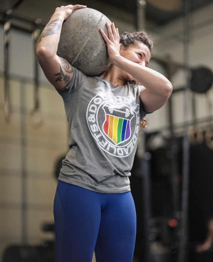 Lifter wearing the Doughnuts and Deadlifts Pride collection