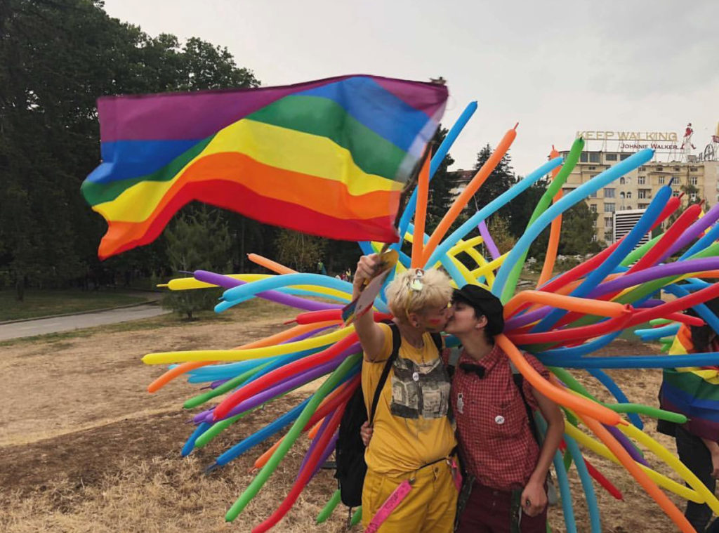 A couple kissing at Sofia Pride