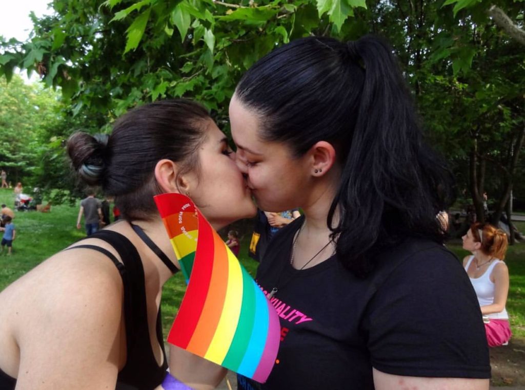 Two girls kissing at Sofia Pride