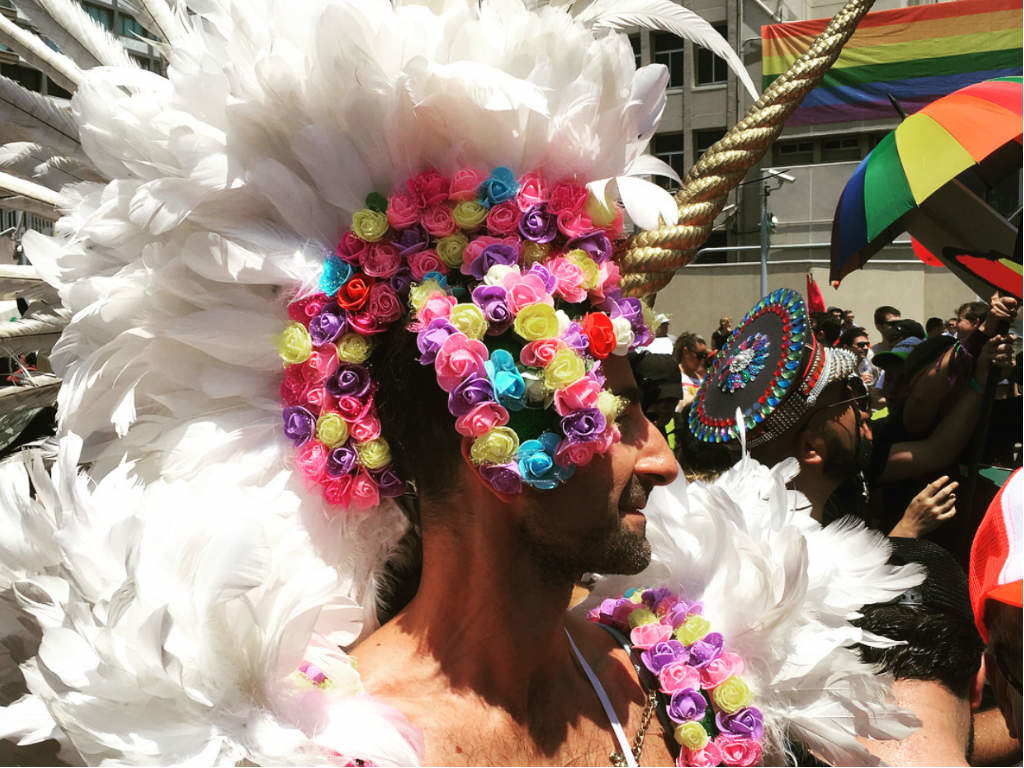 A man in a unicorn costume at Tel Aviv Pride.