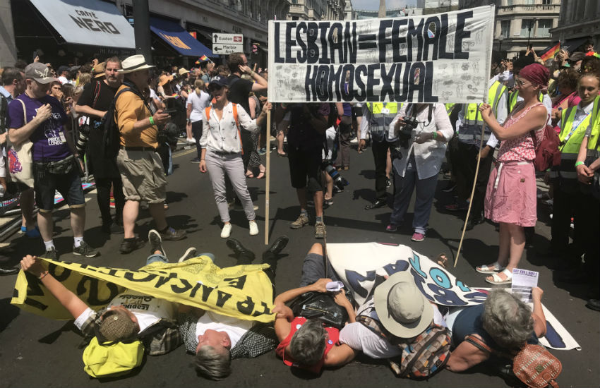 Lesbian activists storm and block the Pride in London parade route