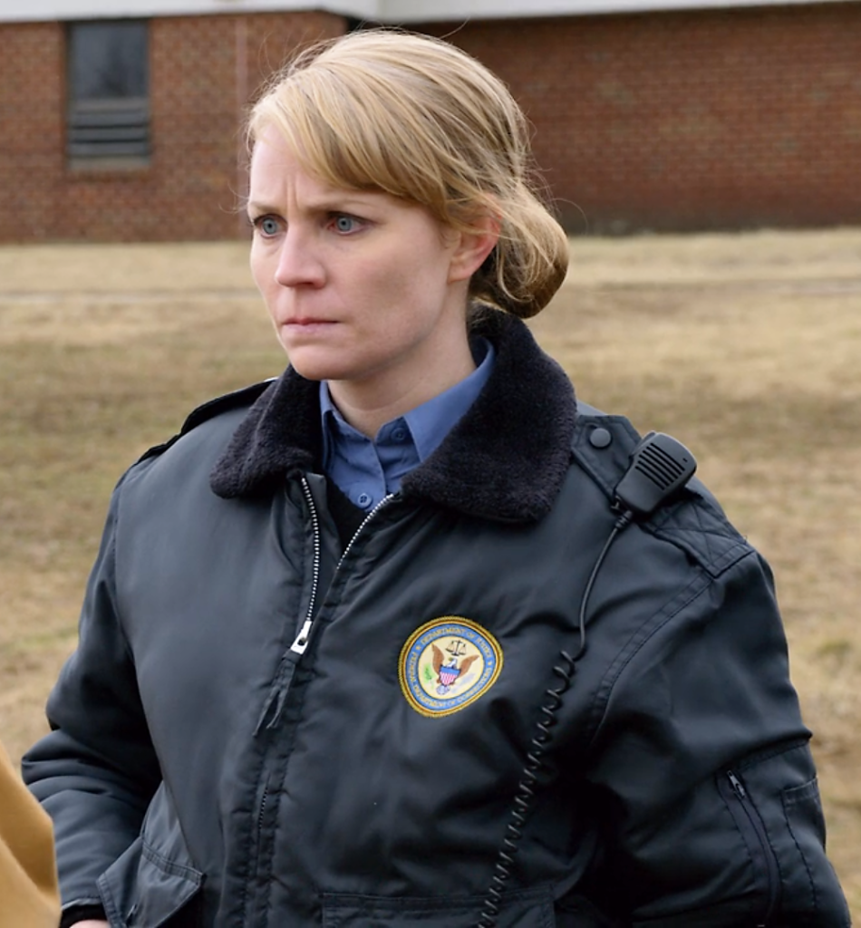 Emily Tarver as CO McCullough in a scene of OITNB.