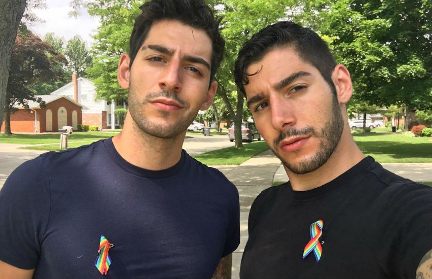 Michael and Zach Zakar wearing rainbow ribbons