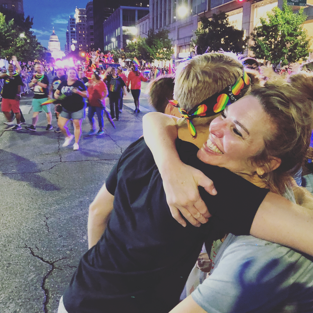 Hugging at Austin Pride