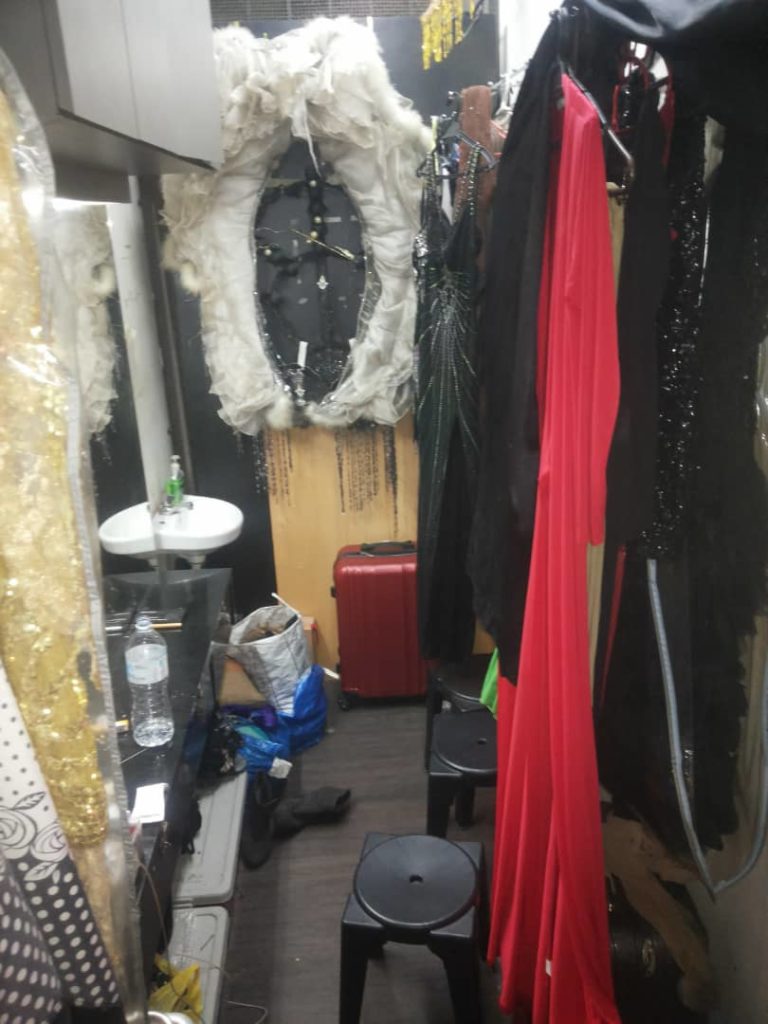 Backstage at blue boy with elaborate costumes