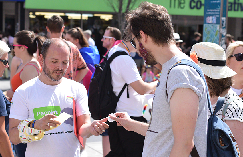 Brighton Pride goers sign the petition for a People's Vote on Brexit.