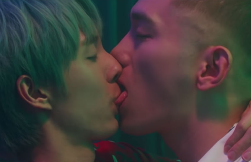 Two guys kissing in new music video for Holland's new song I'm Not Afraid