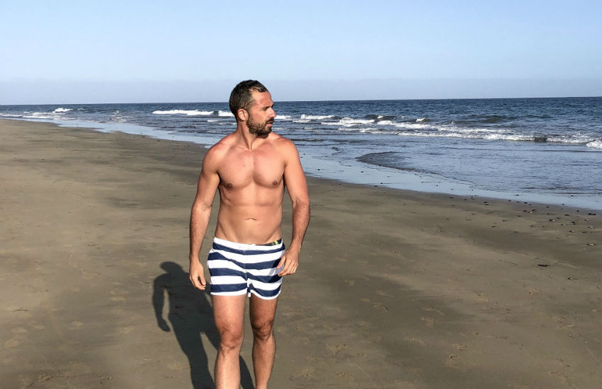 Roberto Cabrera on a beach 