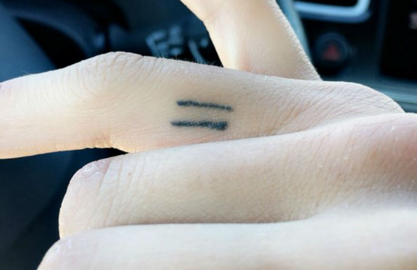 Sarah Eba and her equals sign tattoo