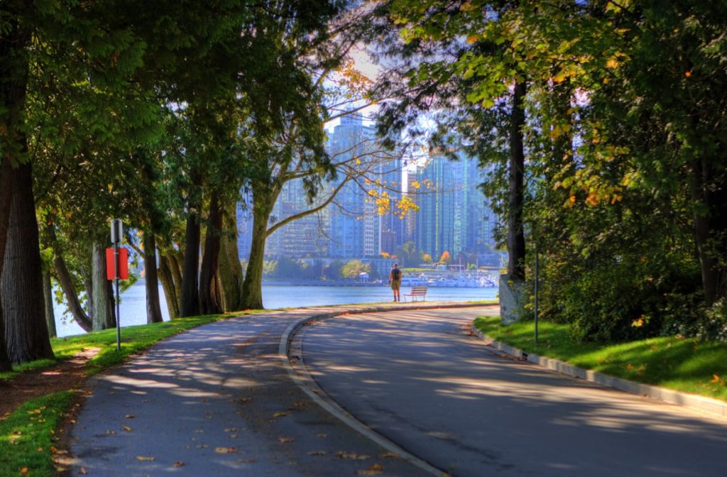 The cycle path follows the seawall around Stanley Park | Photo: Tourism Vancouver/ Clayton Perry