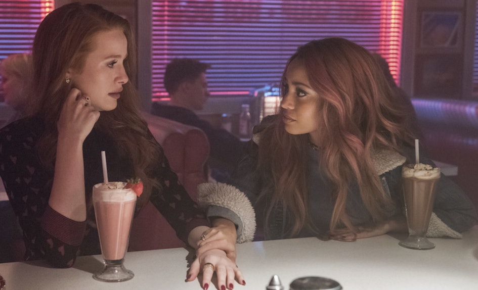 Madelaine Petsch and Vanessa Morgan in a scene of Riverdale.
